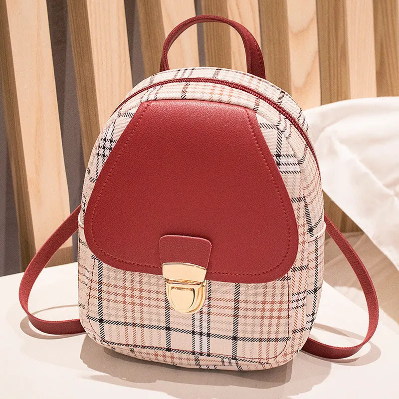 Diagonal phone bag in PU leather available in five colours for shoulder or handheld carrying