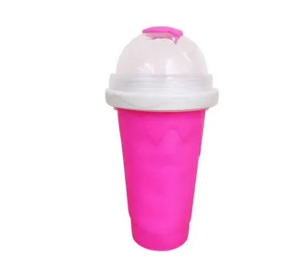 Blue cylindrical silicone pinch cup for making instant slushy smoothies.