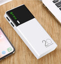 White large capacity mobile power bank with digital display and two USB ports on a clean background