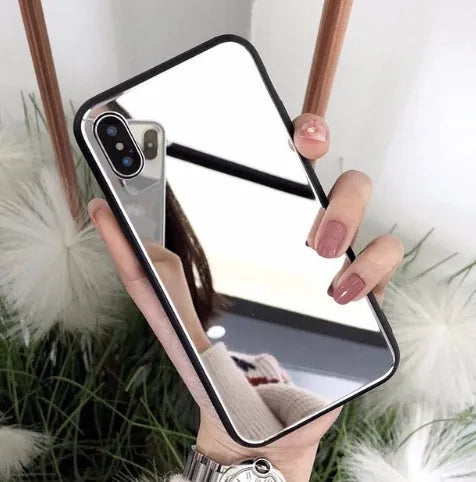 Black iPhone case with a reflective mirror surface on the back, compatible with multiple iPhone models.