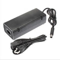 Black Microsoft XBOX360E AC power adapter unit with cable for 220V mains.