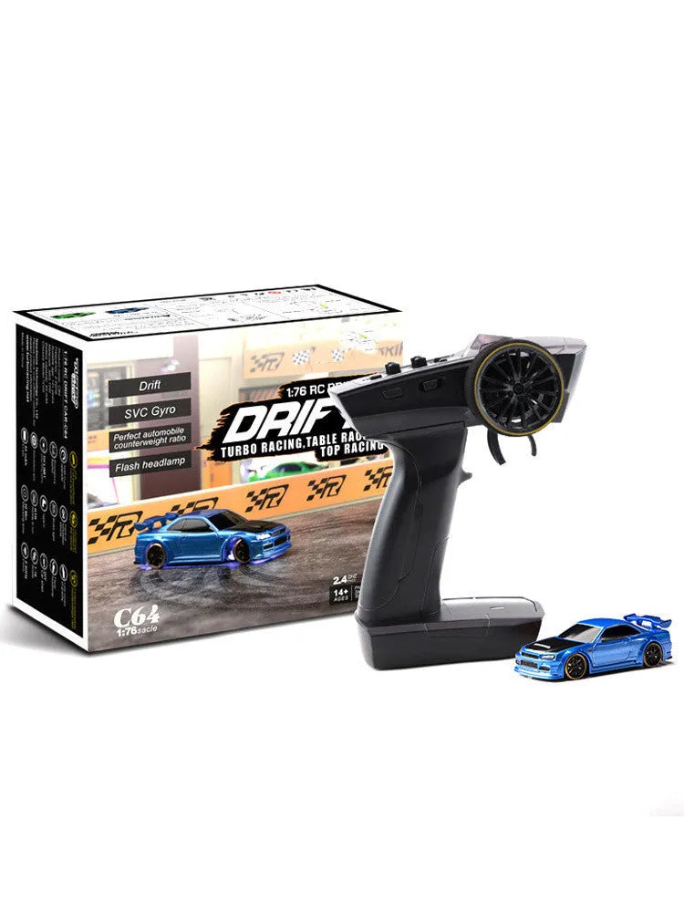 Blue Turbo Racing C64 gyro drift RC car with proportional remote control on a track