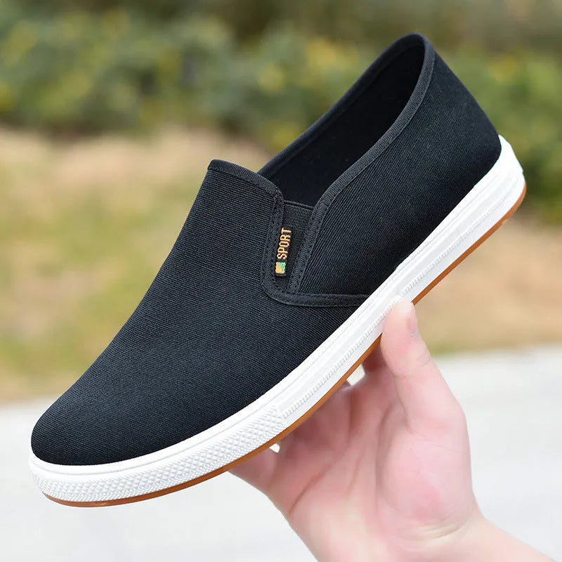 Men's black and blue slip-on canvas cloth shoes with round toe and injection moulded sole