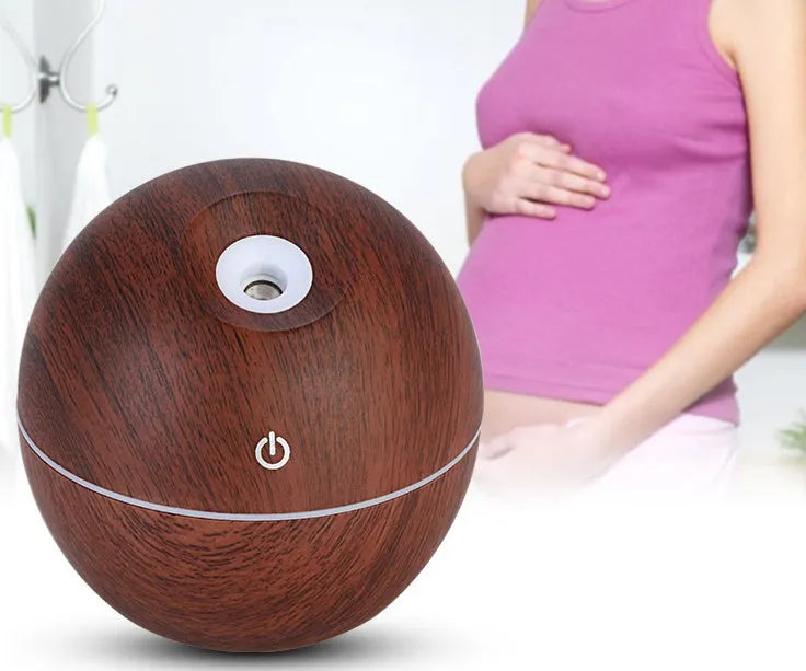 USB ultrasonic essential oil diffuser humidifier with 7 colour LED night light, light wood finish, 95x100mm