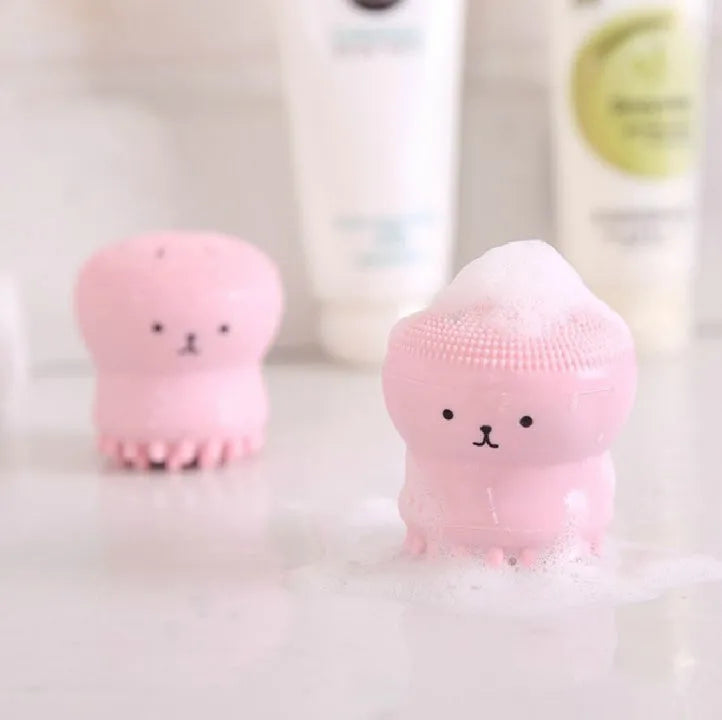 Cartoon octopus silicone wash brush in Blue, Green, Pink, Purple and Rose red for manual facial cleansing and massage.