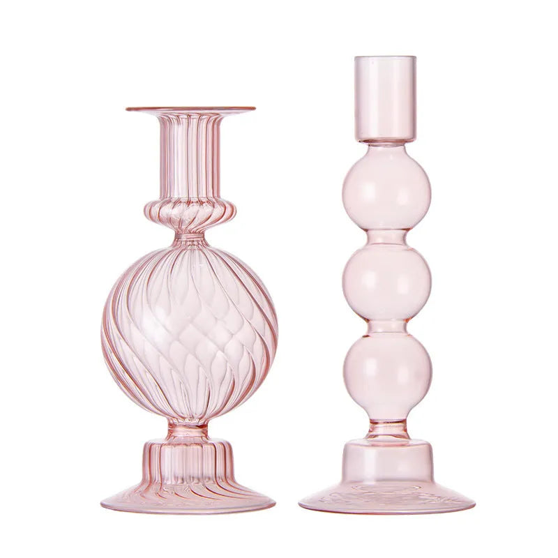 Transparent borosilicate glass candle holder in Three Ball Mott design, available in brown, blue, pink, green