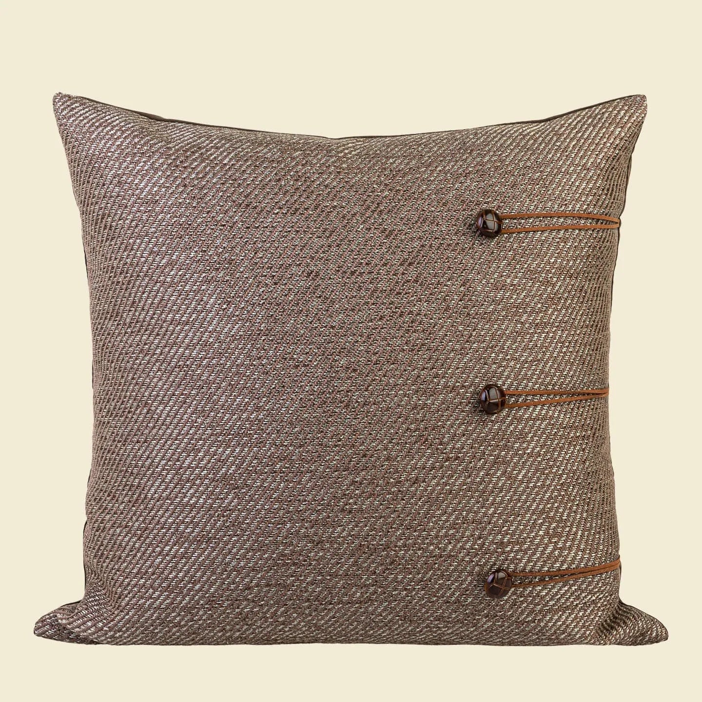 Chinese Ancient Style square pillow cushion on a sofa in a Maillard colour pattern.