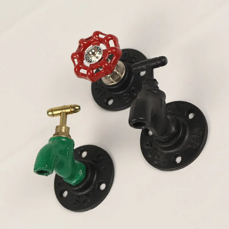 Wall-mounted metal towel rack hook with industrial water pipe design in a choice of three colours.