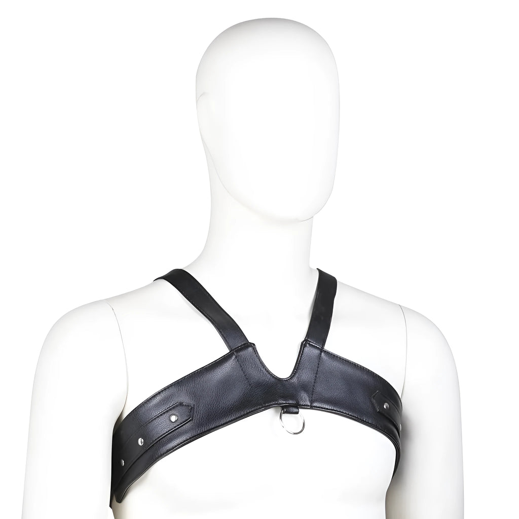 Black leather adjustable men's chest strap harness laid flat on a neutral background with adjustable fastener visible