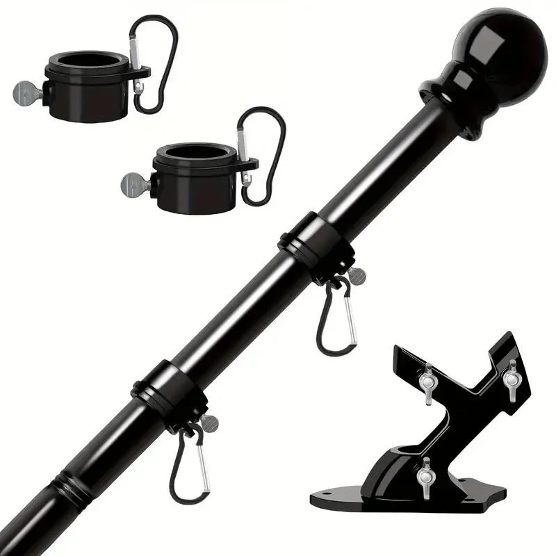 Wall mounted stainless steel sectional flagpole in black finish on a brick wall