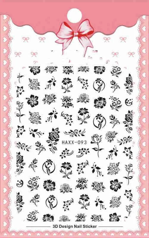 Black butterfly nail stickers with white flower and gold accents on a manicured hand, adhesive decal set