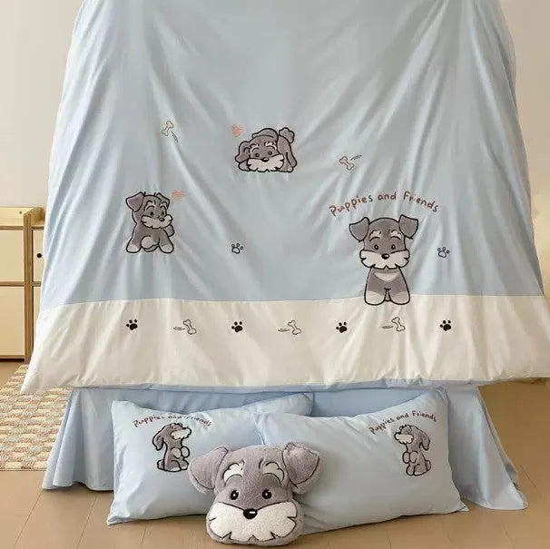Cartoon Schnauzer design embroidered on a light blue cotton quilt cover and pillowcase.