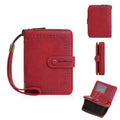 Women's black PU coin purse with zipper, showing integrated card slots inside.
