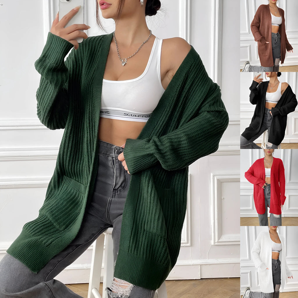 A dark green loose-fit sweater cardigan with two front pockets and long sleeves.