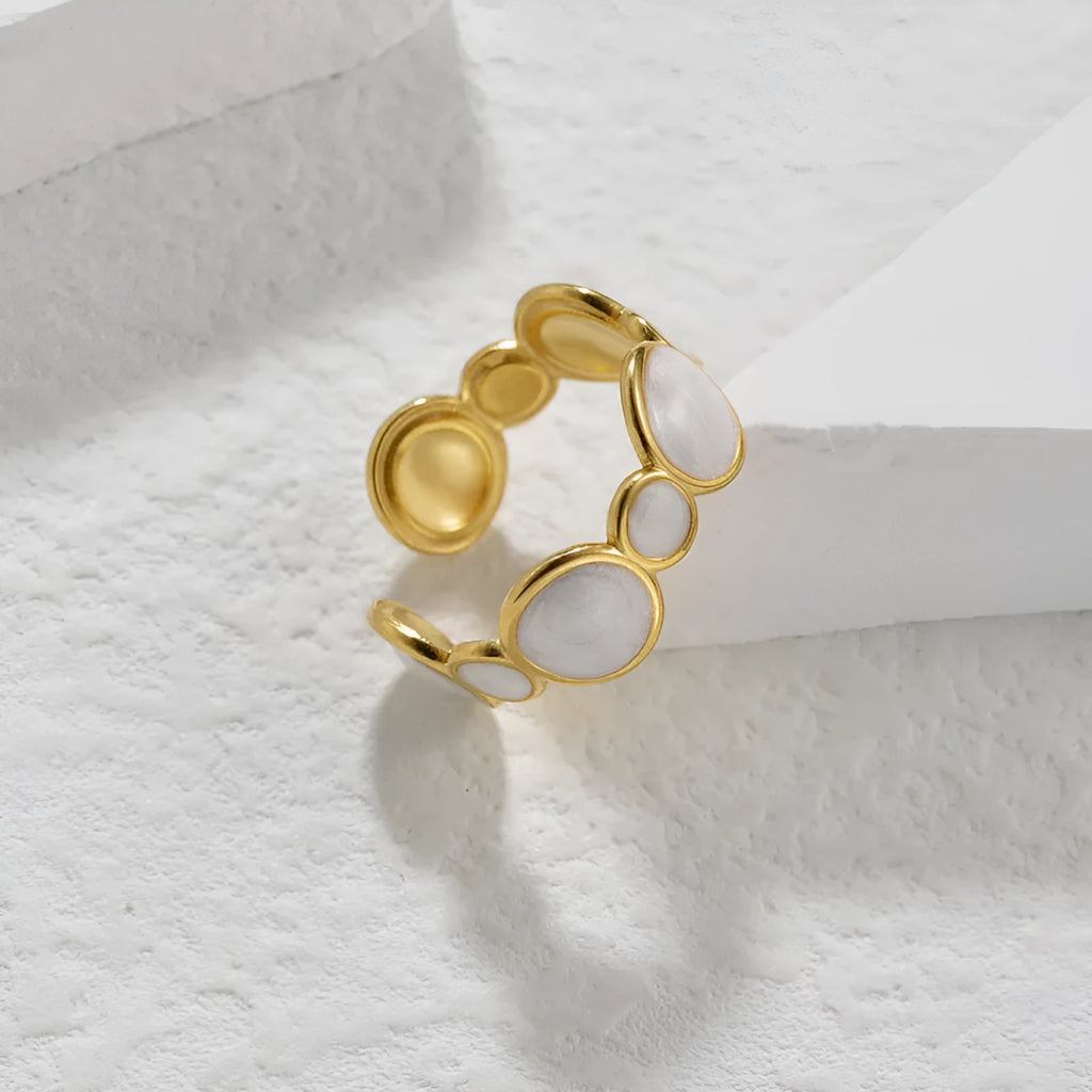 A geometric-shaped stainless steel ring with an adjustable opening and a shiny electroplated finish.