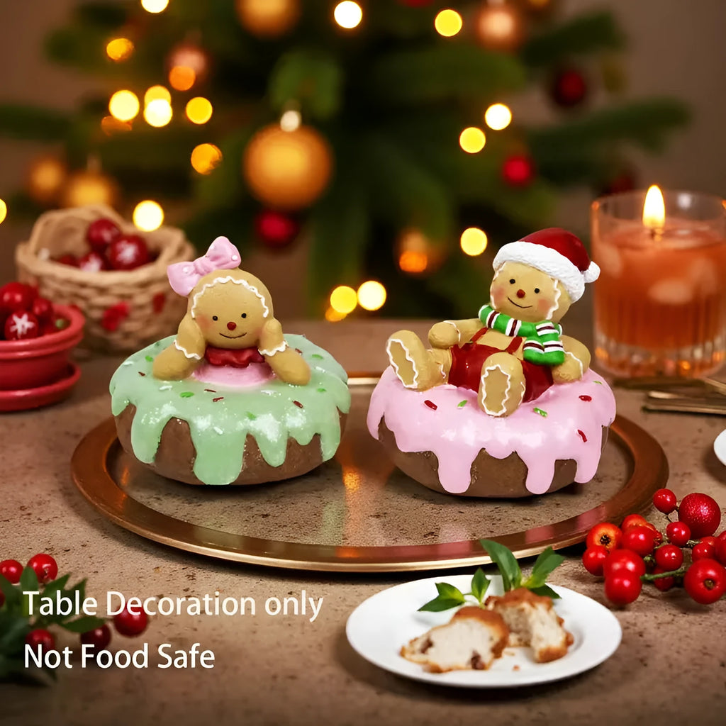 Hand drawn cartoon resin gingerbread man Christmas ornament with pink donut motif on white background