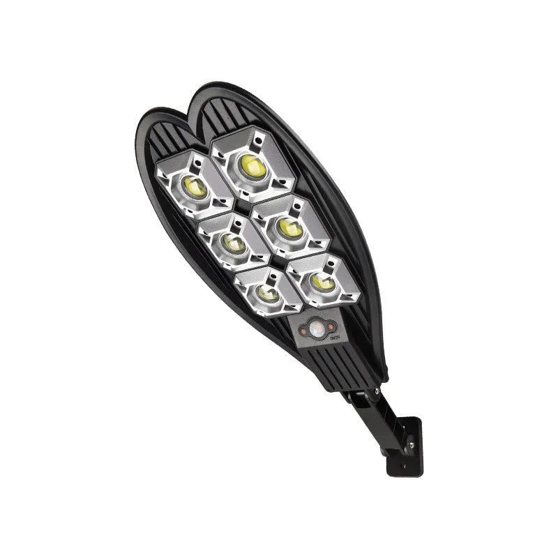 White 6-eye Sword design solar garden lamp with remote control on a grass lawn.