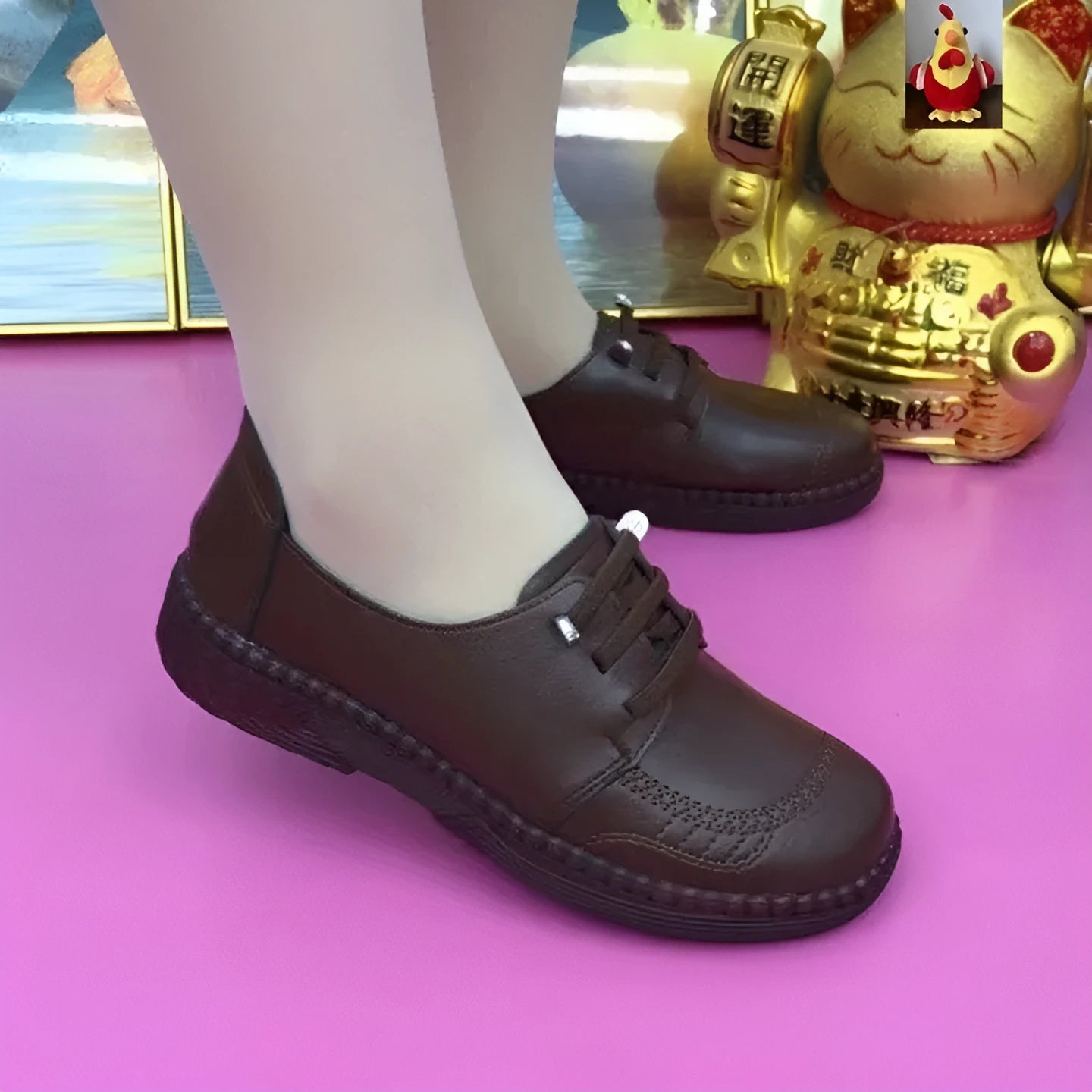 Women's soft leather low heel shoes in black with front lace-up and non-slip rubber sole