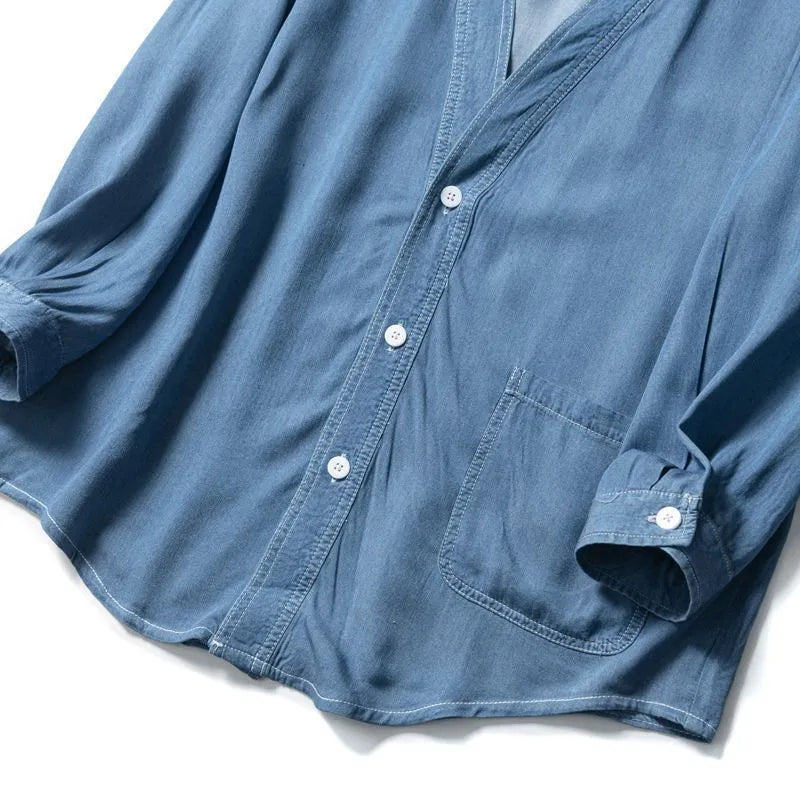 Men's dark blue denim coat with three-quarter sleeves and v-neck collar