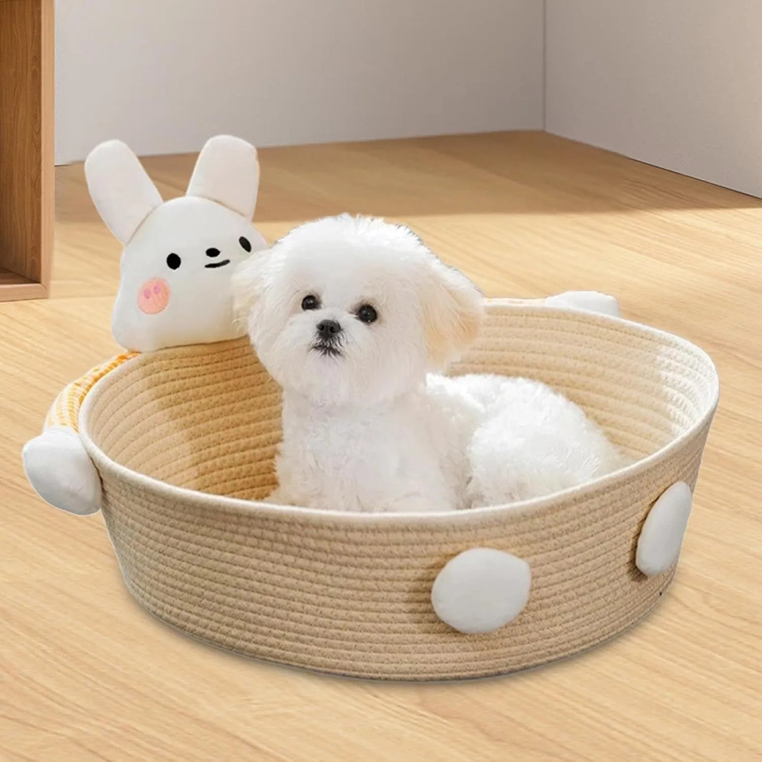 Woven cotton rope cat bed with scratching surface, shown with bear decoration in medium size.