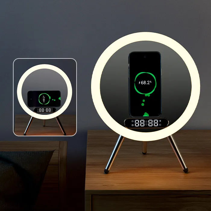 Multi-function LED mirror alarm clock with wireless charger and Bluetooth speaker in white colour on wooden desk