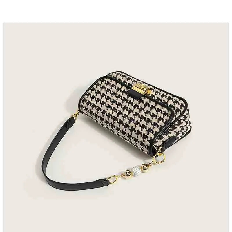 Houndstooth plaid shoulder bag with embossed texture, 23 x 7 x 14 cm, showing slit pocket and picture colour.