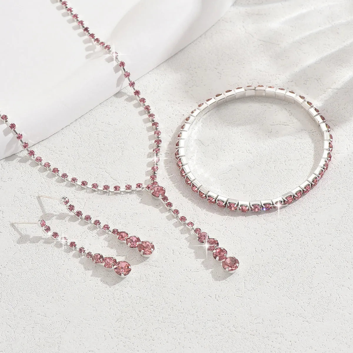 Women's rhinestone jewellery set with tassel and heart-shaped pendants in four colour options