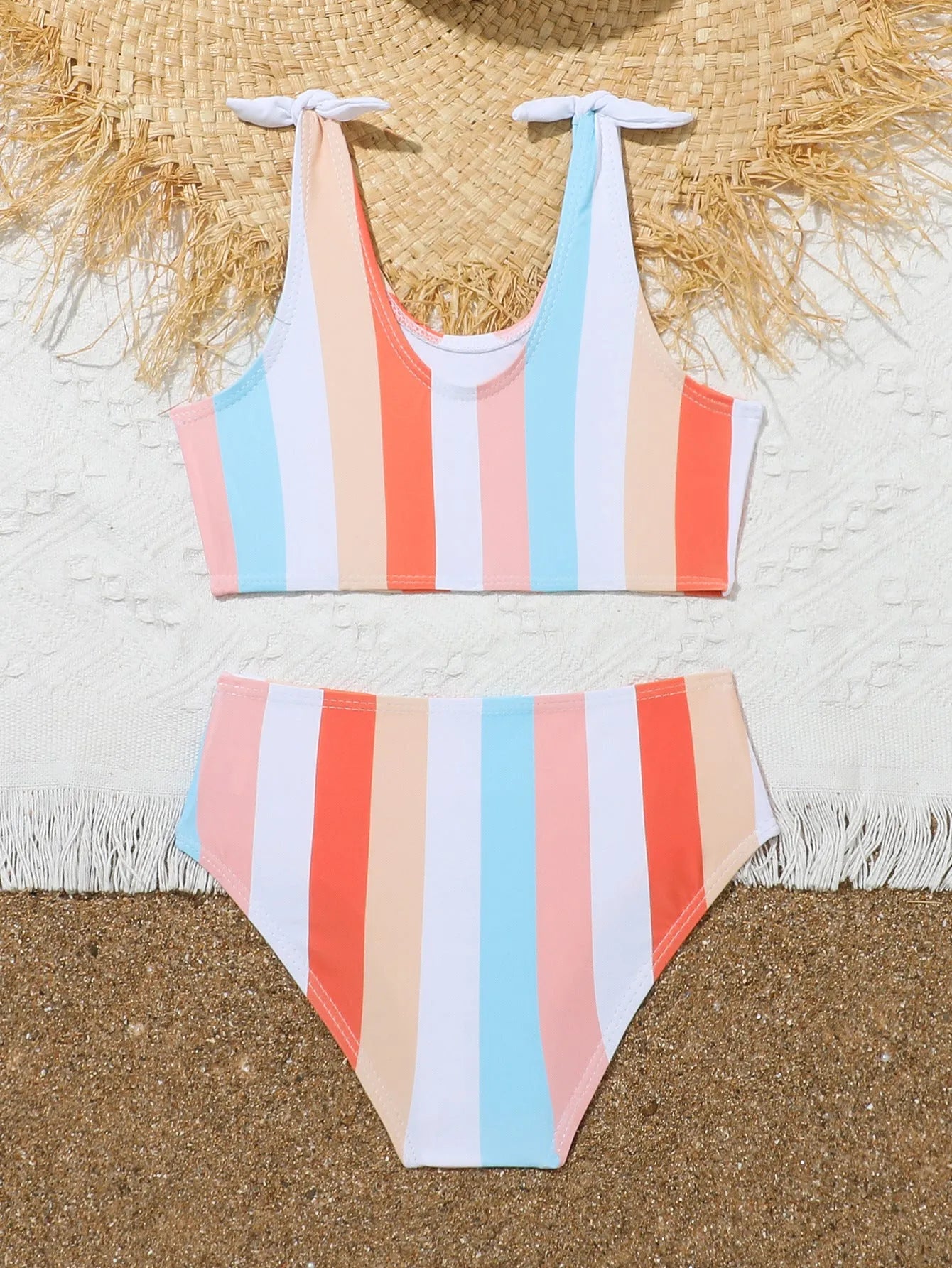 Girls' plaid print swimsuit briefs with polyester lining shown in multiple colour options