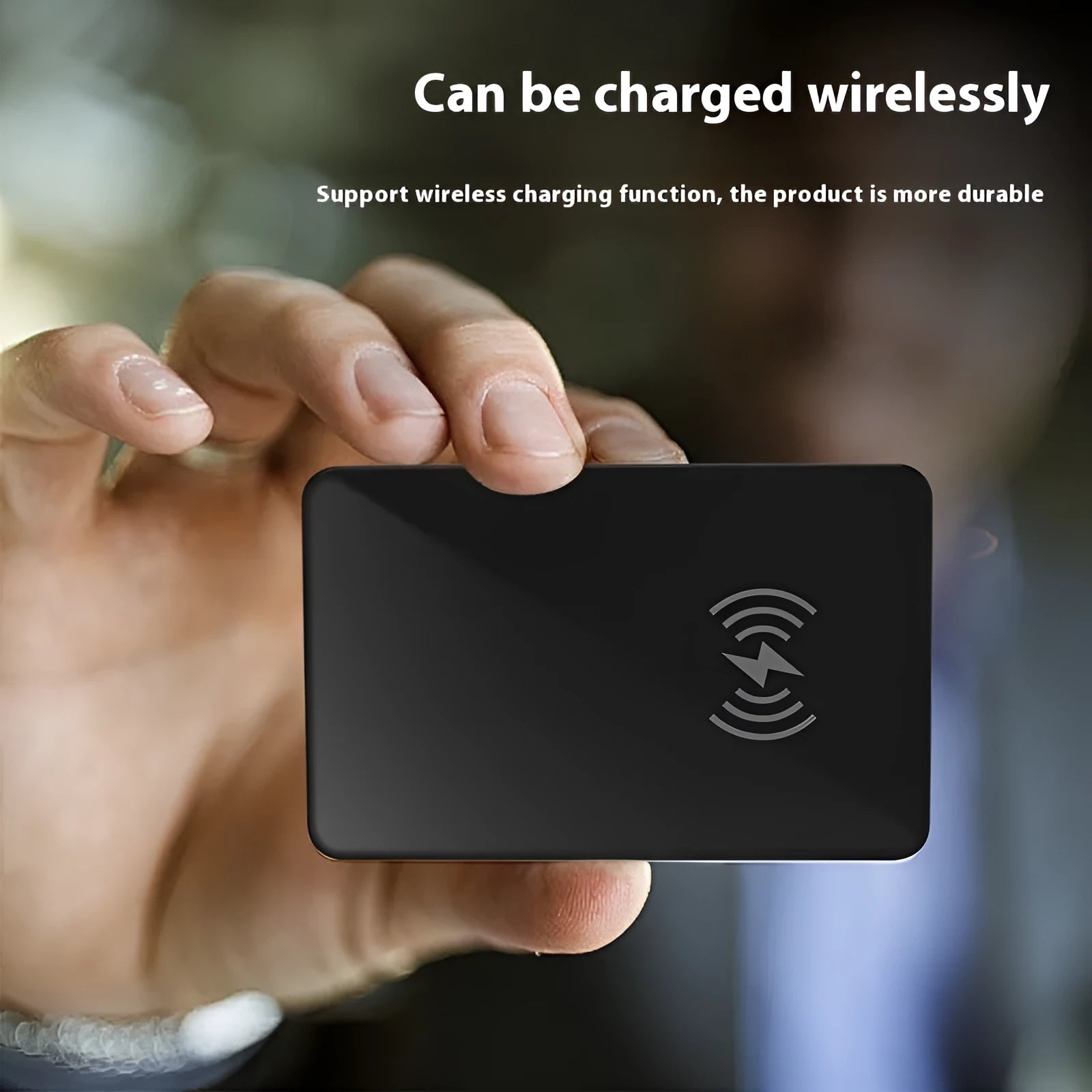 Black rectangular pet tracker card with hanging hole, showing NFC and wireless charging features