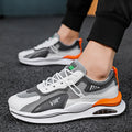Men's grey mesh running shoes with round toe design and lightweight EVA sole