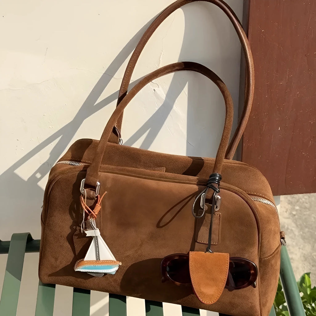 Brown suede large capacity underarm pillow bag with horizontal square shape and zipper closure