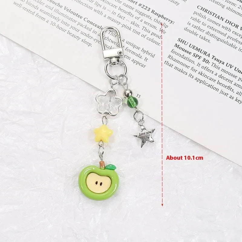 Fruit-themed mobile phone earphone bag pendant keychain in plastic/resin with rope attachment