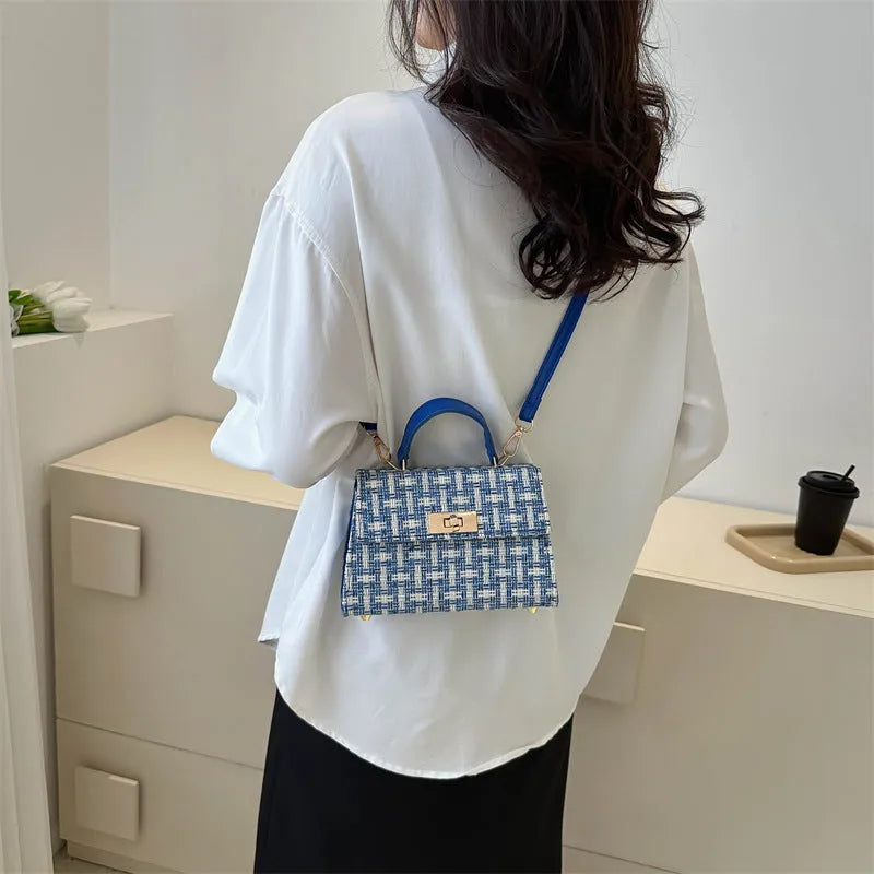 Casual PU crossbody shoulder bag in black with minimal design and strap
