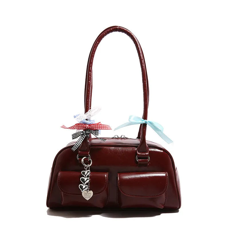 Retro style women's PU leather pillow bag with double shoulder strap in black colour
