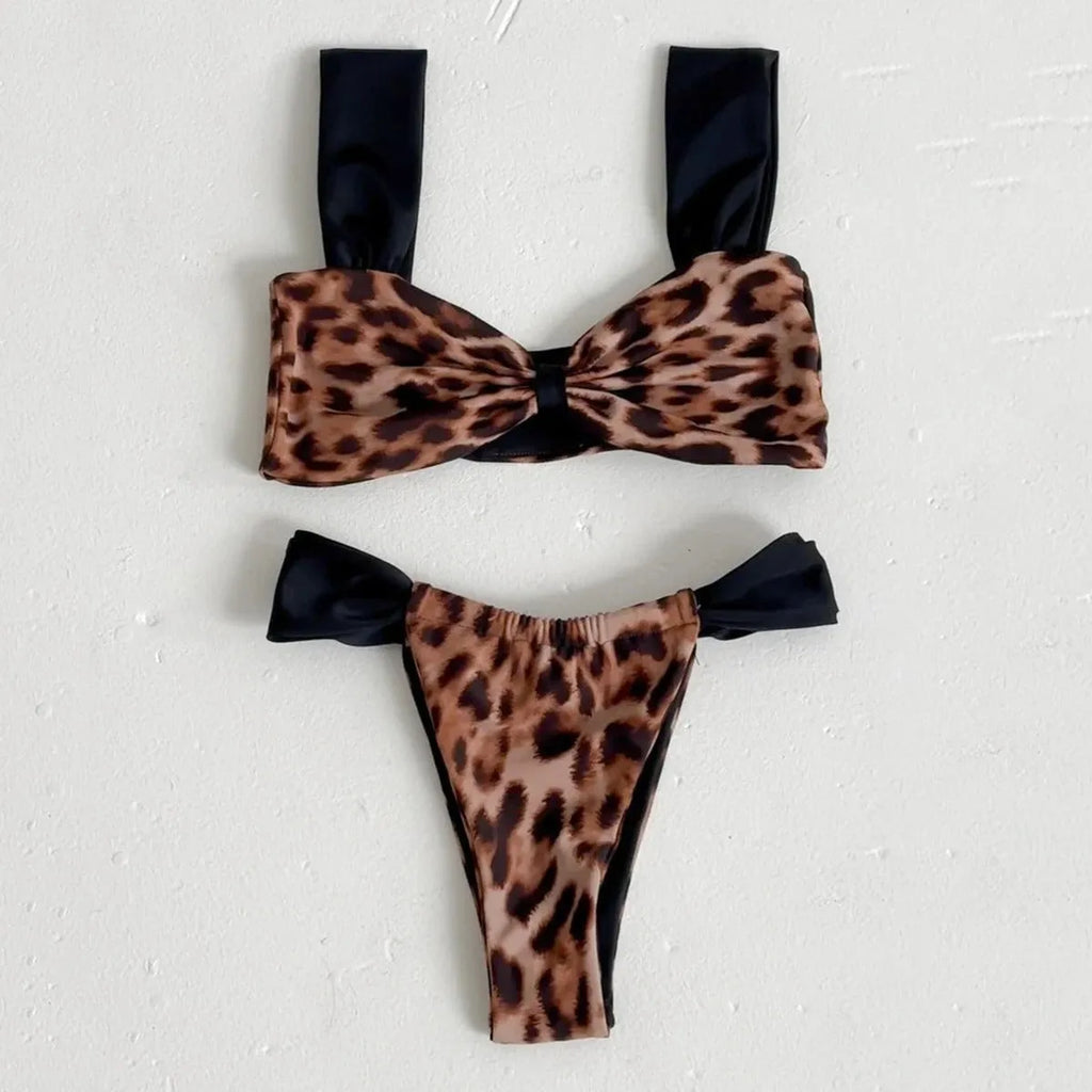 Leopard print women's bikini set showing sleeveless tube top and T-pants on a mannequin.