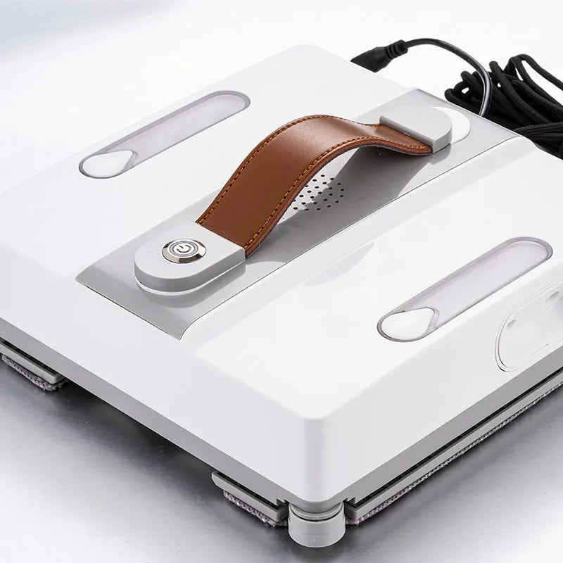 White intelligent window cleaning robot with a square 220mm body on a glass window pane.