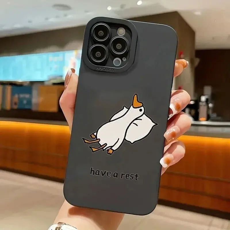 Cartoon duck design silicone iPhone case in black, white, or blue colour