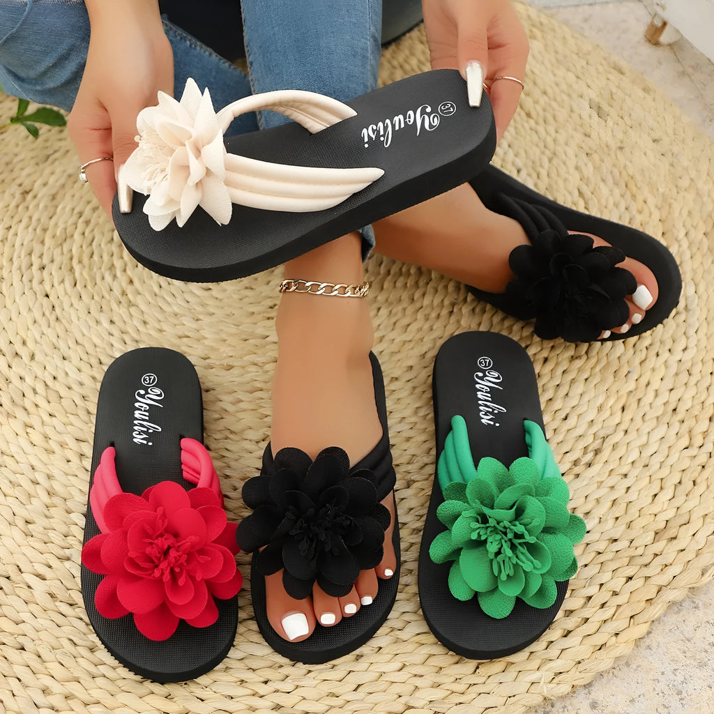 Solid-colour flower flip-flops in beige, red, black, or green with decorative flower design on EVA soles