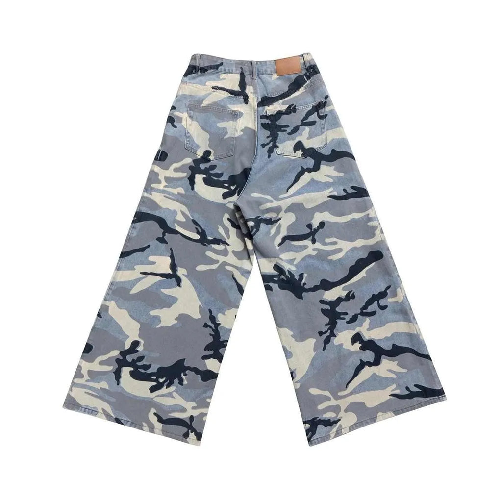 Snow camouflage blue loose fit jeans with mid waist on a hanger