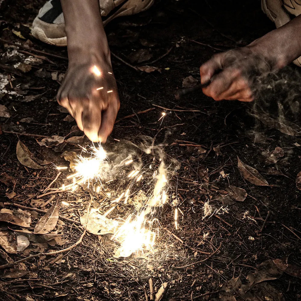 Portable outdoor flint survival tool with sparkstone, cylindrical style