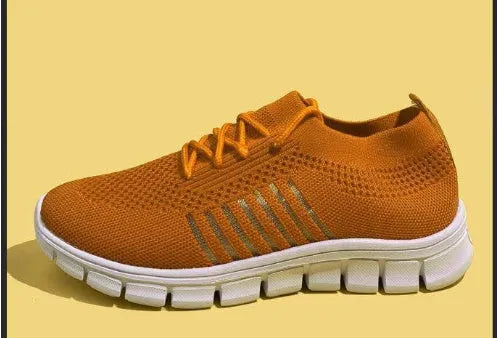 Women's high-cut lace-up casual sneaker in multiple colours on a flat heel with rubber sole