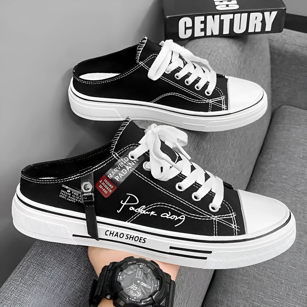 Men's black canvas slip-on shoes with round toe and PVC sole