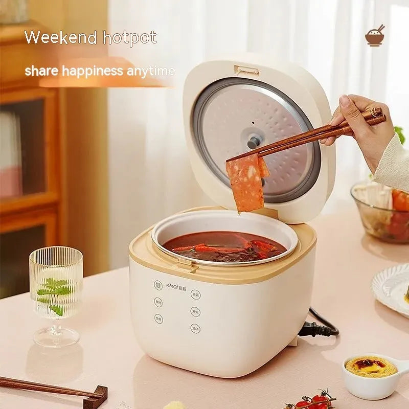 White or beige plastic rice cooker with black crystal inner pot and digital display