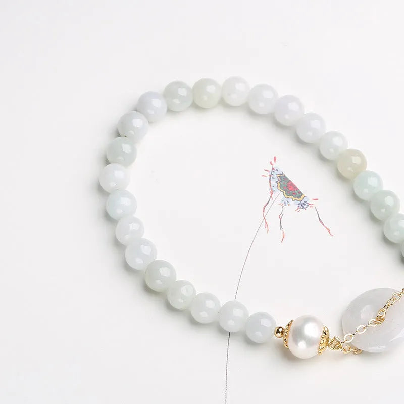 Natural emerald jade peace buckle bracelet with pearl accents and geometric pendant design