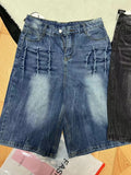 Men's loose washed denim shorts in straight-leg design with mid-waist and cropped length