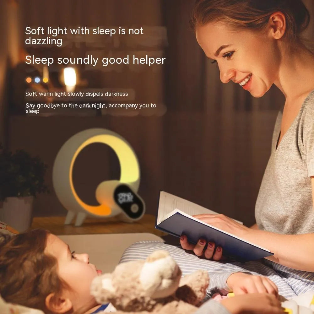Creative Q Light sunrise alarm clock with digital display and colourful LED ring in black or white finish.