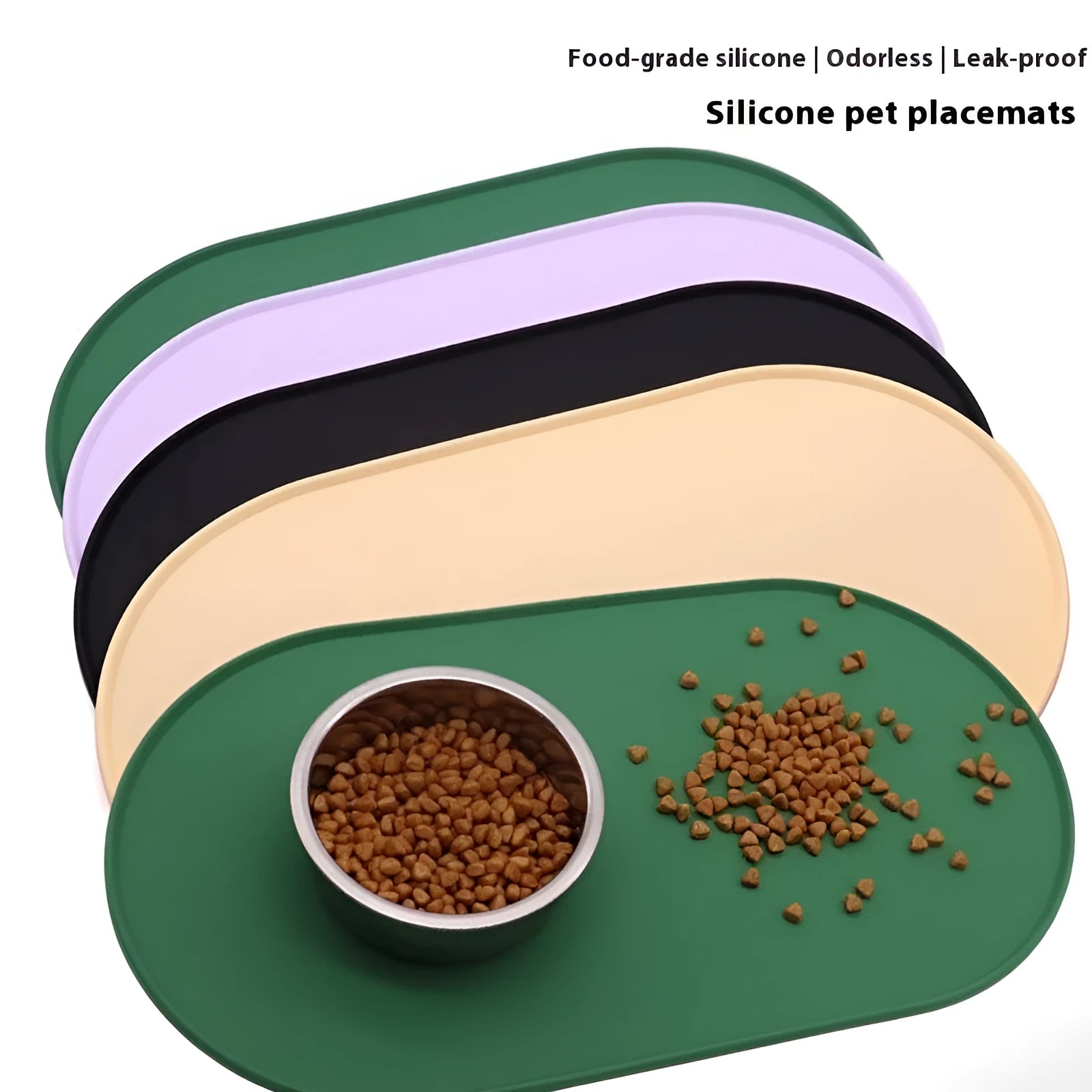 Green silicone cat feeding mat with raised edges containing dry kibble, placed on a wooden floor.