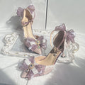 Purple satin women's stiletto shoes with a square toe bracket, shown on a white background.