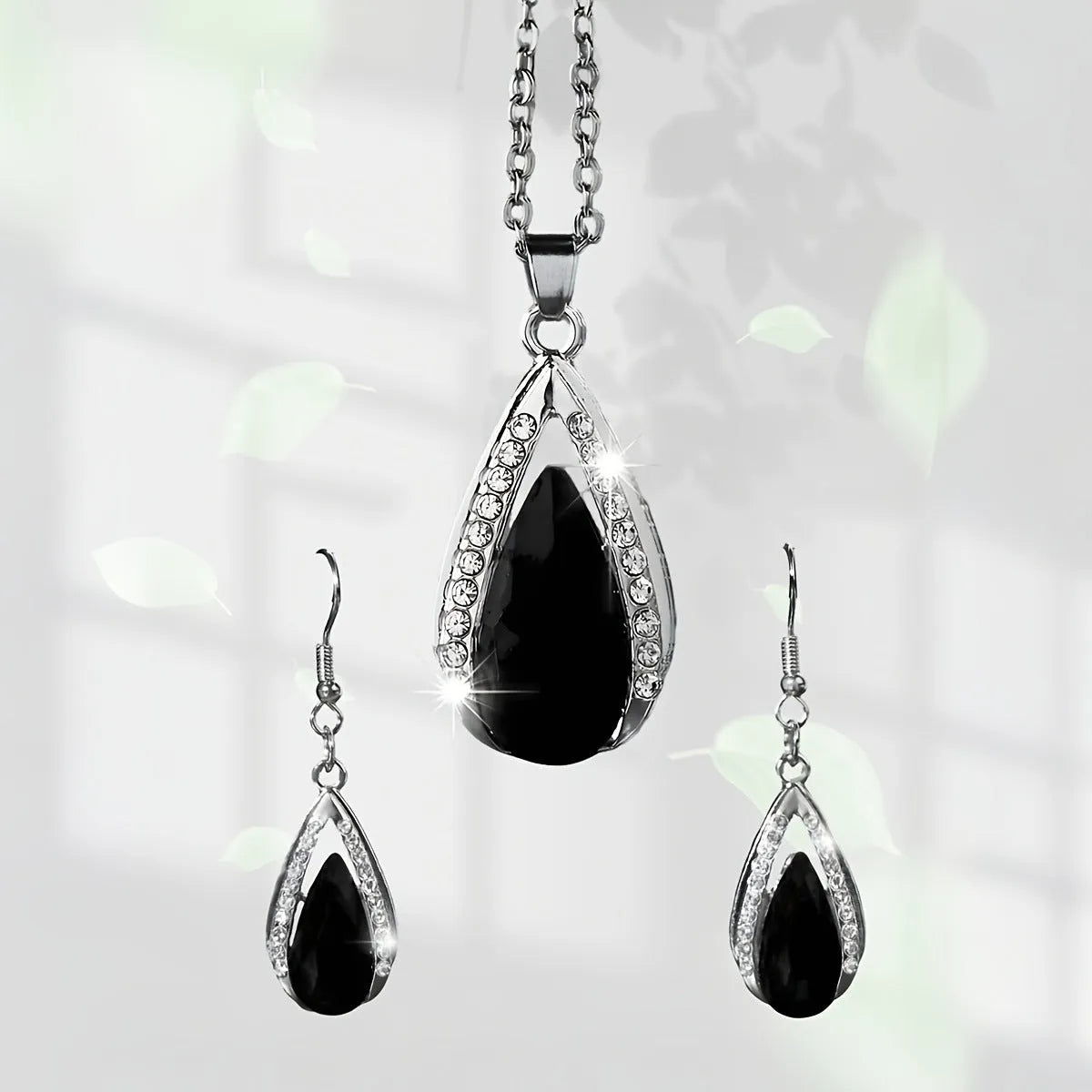 Black and red alloy necklace and earrings set with matching teardrop pendant and droplet earrings.