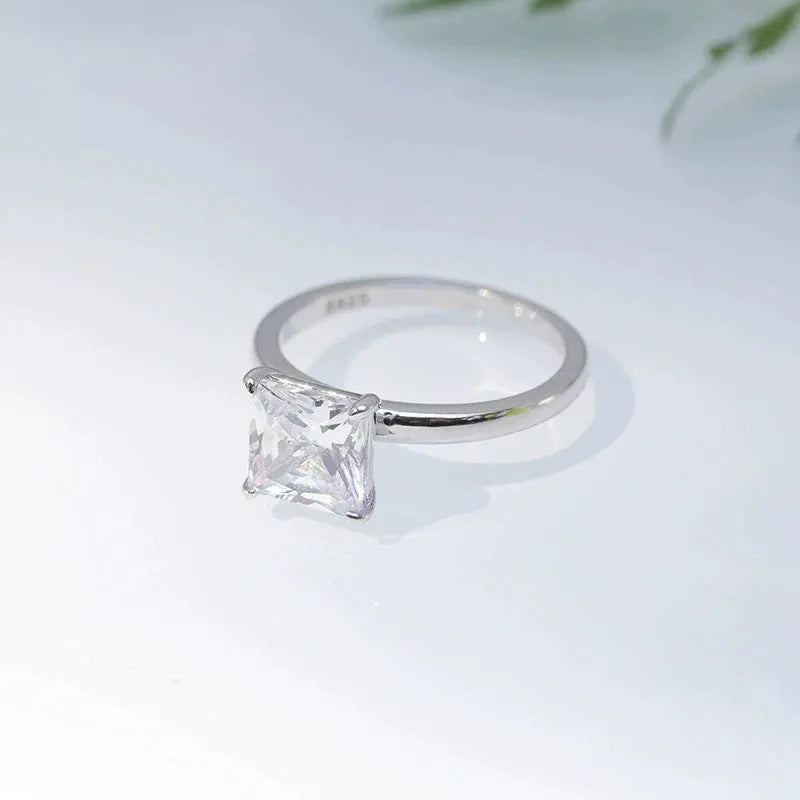 Simple geometric 925 silver ring shown in silver, gold, and rose gold colour options on a plain background.